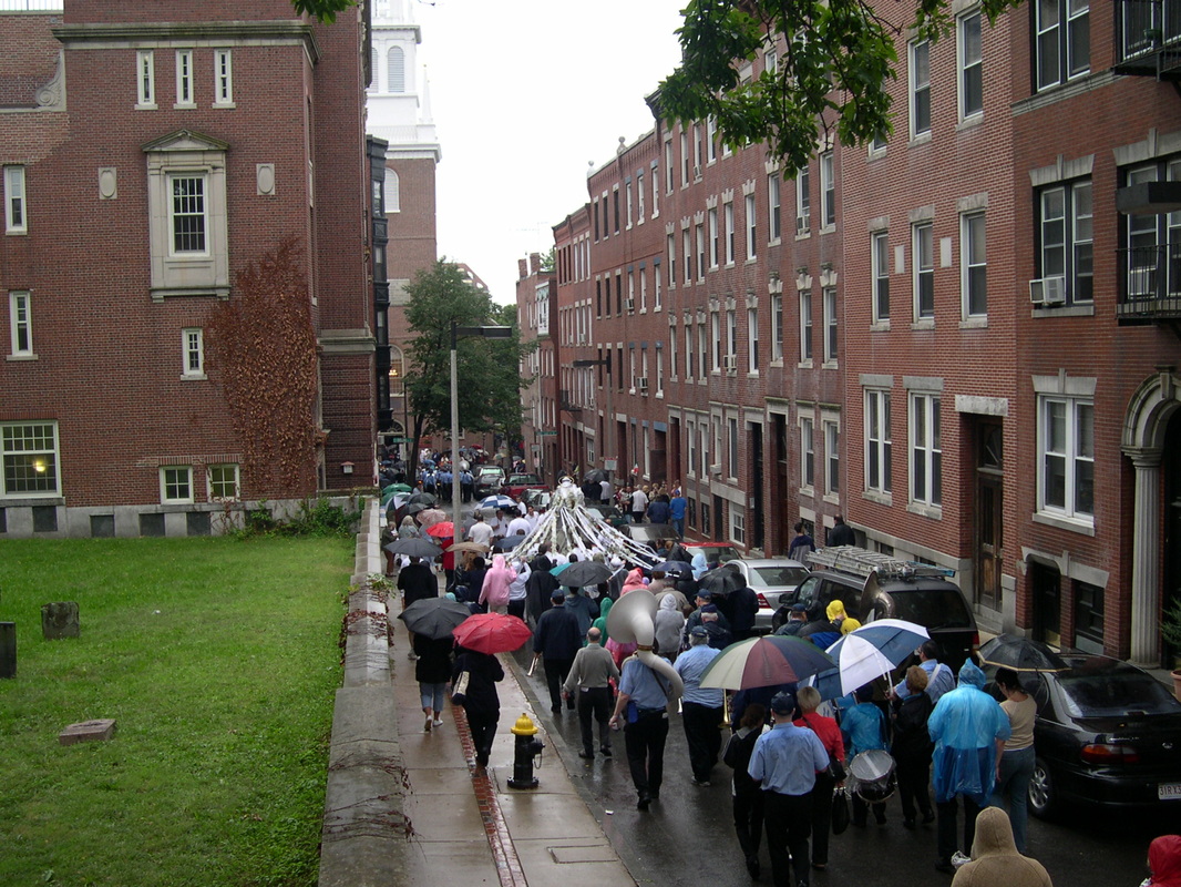 Rain or shine, the St. Anthony's Parade in Boston marches on. 